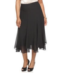 R&M Richards' plus size ruffled-hem skirt makes a sophisticated separate to pair with a silky blouse or a sequined cami for evening celebrations. R&M Richards' plus size ruffled-hem skirt makes a sophisticated separate to pair with a silky blouse or a sequined cami for evening celebrations.
