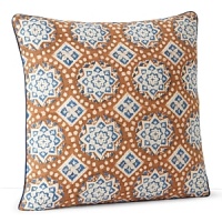 A vivid medallion block print in blue, white and walnut brown.