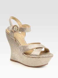 Encrusted in shimmering glitter, this leather slingback has an adjustable ankle strap and covered platform. Self-covered wedge, 5 (125mm)Covered platform, 1½ (40mm)Compares to a 3½ heel (90mm)Glitter-coated leather upperLeather lining and solePadded insoleImportedOUR FIT MODEL RECOMMENDS ordering one size up as this style runs small. Encrusted in shimmering glitter, this leather slingback has an adjustable ankle strap and covered platform. Self-covered wedge, 5 (125mm)Covered platform, 1½ (40mm)Compares to a 3½ heel (90mm)Glitter-coated leather upperLeather lining and solePadded insoleImportedOUR FIT MODEL RECOMMENDS ordering one size up as this style runs small.