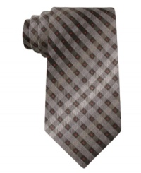 Go off the grid and get out-of-the-box style with this patterned silk tie from DKNY. Go off the grid and get out-of-the-box style with this patterned silk tie from DKNY.