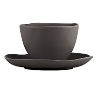 Featuring an organic shape and a matte glaze finish, this bowl and saucer are thoroughly modern and impart natural sophistication. Featuring an organic shape and a matte glaze finish, this bowl and saucer are thoroughly modern and impart natural sophistication.