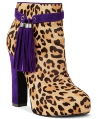 Between the dramatic dalmatian print and the bright, suede tassel on the side the Prita booties by Bebe are a certified head-turner. Between the dramatic dalmatian print and the bright, suede tassel on the side the Prita booties by Bebe are a certified head-turner.
