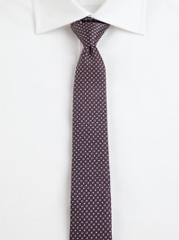 A sleek design, set in perfectly patterned Italian silk.About 2½ wideSilkDry cleanMade in Italy A sleek design, set in perfectly patterned Italian silk.About 2½ wideSilkDry cleanMade in Italy