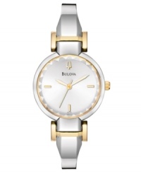 Streamlined and modern, this ultra femme watch from Bulova shines. Silvertone stainless steel bangle bracelet with goldtone accents. Stainless steel round case and dial with logo and stick indices. Quartz movement. Water resistant to 30 meters. 3-year limited warranty. Streamlined and modern, this ultra femme watch from Bulova shines. Silvertone stainless steel bangle bracelet with goldtone accents. Stainless steel round case and dial with logo and stick indices. Quartz movement. Water resistant to 30 meters. 3-year limited warranty.