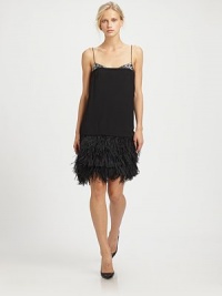 With silk-and-sequin accents on top and layers of lush ostrich feathers on the bottom, an eye-catching silhouette rendered in smooth, chic crepe.Adjustable spaghetti strapsConcealed side zip closureTiered feather hemAbout 16 from natural waistFully linedViscose with silk and ostrich feathersDry cleanImportedModel shown is 5'11 (180cm) wearing US size 4. With silk-and-sequin accents on top and layers of lush ostrich feathers on the bottom, an eye-catching silhouette rendered in smooth, chic crepe.Adjustable spaghetti strapsConcealed side zip closureTiered feather hemAbout 16 from natural waistFully linedViscose with silk and ostrich feathersDry cleanImportedModel shown is 5'11 (180cm) wearing US size 4.