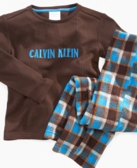 Warm up his winter. When it's time to bed down this thermal tee and plaid fleece pants set from Calvin Klein is an ultra-comfortable style. Warm up his winter. When it's time to bed down this thermal tee and plaid fleece pants set from Calvin Klein is an ultra-comfortable style.
