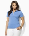 Designed for a trim, body-skimming fit in soft finely ribbed cotton, the iconic polo shirt receives a chic update with gleaming silver-tone metal buttons.