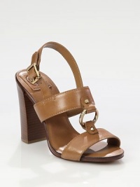 Uplifted by a wide, stacked heel, this leather silhouette features an adjustable slingback strap and buckle hardware. Stacked heel, 4 (100mm)Leather upperLeather liningBuffed leather soleImportedOUR FIT MODEL RECOMMENDS ordering one half size up as this style runs small. Uplifted by a wide, stacked heel, this leather silhouette features an adjustable slingback strap and buckle hardware. Stacked heel, 4 (100mm)Leather upperLeather liningBuffed leather soleImportedOUR FIT MODEL RECOMMENDS ordering one half size up as this style runs small.