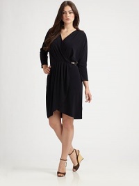 Designed to give you one of the most enviable silhouettes around, this faux-wrap design features pleated/gathered details and a waist-defining belt.V-necklineThree-quarter sleevesGathered, belted silhouettePleated, faux-wrap frontTulip skirtPull-on styleAbout 23 from natural waist94% polyester/6% spandexMachine washImported Designed to give you one of the most enviable silhouettes around, this faux-wrap design features pleated/gathered details and a waist-defining belt.V-necklineThree-quarter sleevesGathered, belted silhouettePleated, faux-wrap frontTulip skirtPull-on styleAbout 23 from natural waist94% polyester/6% spandexMachine washImported
