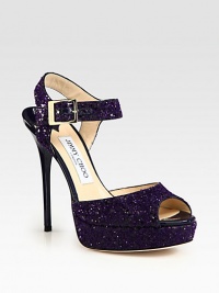Step out in this heightened platform silhouette of glitter-coated leather with a timeless peep toe. Lacquered heel, 4¾ (120mm)Glitter-coated leather platform, 1 (25mm)Compares to a 3¾ heel (95mm)Glitter-coated leather upper with patent leather trimLeather lining and solePadded insoleMade in Italy Step out in this heightened platform silhouette of glitter-coated leather with a timeless peep toe. Lacquered heel, 4¾ (120mm)Glitter-coated leather platform, 1 (25mm)Compares to a 3¾ heel (95mm)Glitter-coated leather upper with patent leather trimLeather lining and solePadded insoleMade in Italy