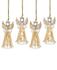 Combining clear glass with a dusting of gold, these angel ornaments are utterly beautiful with their hands raised in prayer and clasped together. Keep them as a set or share with loved ones to celebrate the holiday season. Combining clear glass with a dusting of gold, these angel ornaments are utterly beautiful with their hands raised in prayer and clasped together. Keep them as a set or share with loved ones to celebrate the holiday season.