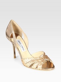 Undeniably chic metallic leather in a classic d'Orsay silhouette, sprinkled in glitz. Lacquered heel, 3½ (90mm)Glitter-coated metallic leather upperLeather lining and solePadded insoleMade in ItalyOUR FIT MODEL RECOMMENDS ordering one half size up as this style runs small. 