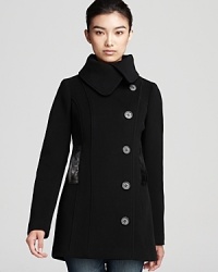 Leather accents bring fashion-forward edge to this plush pea coat from Mackage. Leather accents bring fashion-forward edge to this plush pea coat from Mackage.