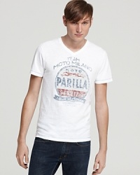The faded moto graphic print on the front of this slim-fitting V-neck tee recalls an enchanted era of Italian racing. The faded moto graphic print on the front of this slim-fitting V-neck tee recalls an enchanted era of Italian racing.