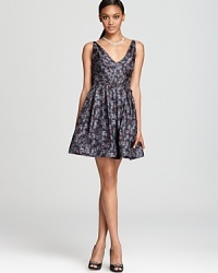 A vibrant, colorful print glows on this Z Spoke by Zac Posen dress, a playful choice that stands effortlessly on its own. A vibrant, colorful print glows on this Z Spoke by Zac Posen dress, a playful choice that stands effortlessly on its own.