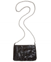 Tap into the reptilian trend with this snakeskin print silhouette from BCBGeneration. Effortlessly on-trend, let this lovely be the go-to bag for your next night out. Tap into the reptilian trend with this snakeskin print silhouette from BCBGeneration. Effortlessly on-trend, let this lovely be the go-to bag for your next night out.