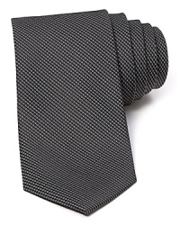 A micro basketweave pattern lends a classic look to this luxe silk tie from The Men's Store at Bloomingdale's. A micro basketweave pattern lends a classic look to this luxe silk tie from The Men's Store at Bloomingdale's.