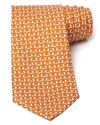 Slick dolphins do their tricks atop a classic silk tie from Salvatore Ferragamo. Slick dolphins do their tricks atop a classic silk tie from Salvatore Ferragamo.