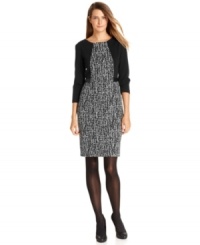 A tweed-like texture at the center bodice and skirt and a pop of faux leather trim at the waist make this Calvin Klein dress an intriguing addition to your weekday wardrobe. A tweed-like texture at the center bodice and skirt and a pop of faux leather trim at the waist make this Calvin Klein dress an intriguing addition to your weekday wardrobe.