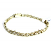 B. Brilliant 18K Gold over Sterling Silver and Cubic Zirconia Tennis Bracelet B. Brilliant 18K Gold over Sterling Silver and Cubic Zirconia Tennis Bracelet