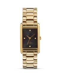 Take an uptown approach to accessorizing with this gold-plated watch from kate spade new york. It's rectangular design is city chic, while a glitzy bezel and gold band adds glamour. Take an uptown approach to accessorizing with this gold-plated watch from kate spade new york. It's rectangular design is city chic, while a glitzy bezel and gold band adds glamour.