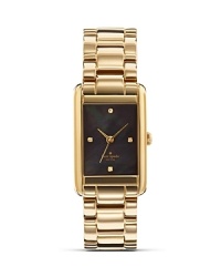 Take an uptown approach to accessorizing with this gold-plated watch from kate spade new york. It's rectangular design is city chic, while a glitzy bezel and gold band adds glamour.