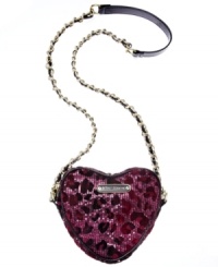 Set any look aflutter with this glittery heart-shaped design from Betsey Johnson. Featuring signature detailing, sequin pattern and chain-link strap, it's the one fashion beat you won't want to miss. Set any look aflutter with this glittery heart-shaped design from Betsey Johnson. Featuring signature detailing, sequin pattern and chain-link strap, it's the one fashion beat you won't want to miss.