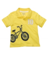 Whether he gets around by bike, truck or animal, he'll do it while looking great in a sporty graphic polo shirt from Osh Kosh. Whether he gets around by bike, truck or animal, he'll do it while looking great in a sporty graphic polo shirt from Osh Kosh.