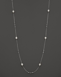 This sterling silver necklace, gleaming with freshwater pearls, makes an elegant statement. By Di MODOLO. This sterling silver necklace, gleaming with freshwater pearls, makes an elegant statement. By Di MODOLO.