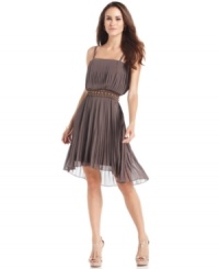 Nine West's dress balances a flirty femme feel with a dose of daring thanks to its blouson-style bodice, pretty pleating and edgy studded waistband. Nine West's dress balances a flirty femme feel with a dose of daring thanks to its blouson-style bodice, pretty pleating and edgy studded waistband.