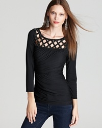 The cutout craze is front and center on this Plenty by Tracy Reese tee. Pair it will skinny jeans and heels to dress up your look in an instant. The cutout craze is front and center on this Plenty by Tracy Reese tee. Pair it will skinny jeans and heels to dress up your look in an instant.