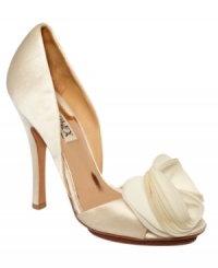 The night's just getting started. These gorgeous two-piece pumps by Badgley Mischka feature an elaborate silk flower detail on the toe. The night's just getting started. These gorgeous two-piece pumps by Badgley Mischka feature an elaborate silk flower detail on the toe.