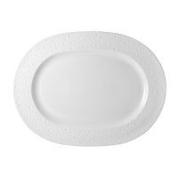 A fine offering from Bernardaud, featuring a classic shape in pure white porcelain with an understated pattern for simple elegance that complements traditional and modern table settings alike. A fine offering from Bernardaud, featuring a classic shape in pure white porcelain with an understated pattern for simple elegance that complements traditional and modern table settings alike.