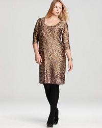 A sleek metallic print adds rebellious edge to a sophisticated Melissa Masse Plus sheath dress. A sleek metallic print adds rebellious edge to a sophisticated Melissa Masse Plus sheath dress.