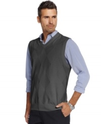 This sweater vest from Oscar de la Renta adds a clean-cut look and extra warmth for when the weather cools. This sweater vest from Oscar de la Renta adds a clean-cut look and extra warmth for when the weather cools.