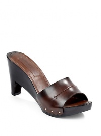 THE LOOKWide leather top strap with seam detailingZigzag leather edges at sidesNail head accentsPadded insoleModified wooden heel, 3¾ (95mm)Wooden platform, ½ (15mm)Compares to a 3¼ heel (80mm)THE MATERIALLeather upperLeather lining and soleORIGINMade in Italy THE LOOKWide leather top strap with seam detailingZigzag leather edges at sidesNail head accentsPadded insoleModified wooden heel, 3¾ (95mm)Wooden platform, ½ (15mm)Compares to a 3¼ heel (80mm)THE MATERIALLeather upperLeather lining and soleORIGINMade in Italy