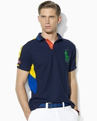 Crafted from performance piqué in a trim, modern fit, Ralph Lauren's official limited edition US Open polo features moisture management properties for superior mobility, comfort and breathability. Crafted from performance piqué in a trim, modern fit, Ralph Lauren's official limited edition US Open polo features moisture management properties for superior mobility, comfort and breathability.