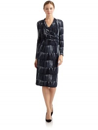 THE LOOKAbstract graphic patternSurplice v-neckDraped detailing at bodice Long sleevesPleated skirtBack zipper with hook-and-eye closureTHE FITAbout 41 from shoulder to hemTHE MATERIALViscoseFully linedCARE & ORIGINDry cleanMade in ItalyModel shown is 5'9 (175cm) wearing US size 4. THE LOOKAbstract graphic patternSurplice v-neckDraped detailing at bodice Long sleevesPleated skirtBack zipper with hook-and-eye closureTHE FITAbout 41 from shoulder to hemTHE MATERIALViscoseFully linedCARE & ORIGINDry cleanMade in ItalyModel shown is 5'9 (175cm) wearing US size 4.