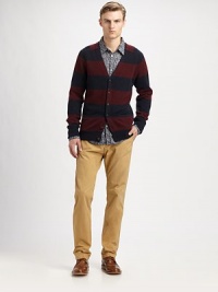 A charming winter essential knitted in striped lambswool with leather elbow patches and ribbed trim.Button-frontRibbed knit cuffs and hemWaist patch pocketsWoolDry cleanImported A charming winter essential knitted in striped lambswool with leather elbow patches and ribbed trim.Button-frontRibbed knit cuffs and hemWaist patch pocketsWoolDry cleanImported