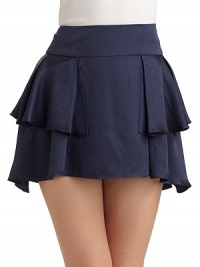Wrap-around ruffles in shimmering silk, with a hem that dips slightly lower in back.Wide set-on waistband Ruffled detail Back hook and zipper closure About 15½ long Silk; dry clean Imported Wrap-around ruffles in shimmering silk, with a hem that dips slightly lower in back.Wide set-on waistband Ruffled detail Back hook and zipper closure About 15½ long Silk; dry clean Imported