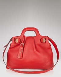 Iconic style is simple with Salvatore Ferragamo's perfectly shaped satchel in soft, luxe leather. Iconic style is simple with Salvatore Ferragamo's perfectly shaped satchel in soft, luxe leather.