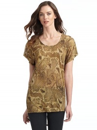 THE LOOKSnakeskin printScoop necklineShort sleevesUneven hemTHE FITAbout 31 from shoulder to longest point of hemTHE MATERIALRayonCARE & ORIGINDry cleanMade in USA THE LOOKSnakeskin printScoop necklineShort sleevesUneven hemTHE FITAbout 31 from shoulder to longest point of hemTHE MATERIALRayonCARE & ORIGINDry cleanMade in USA