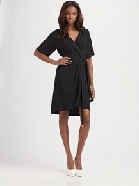 The famous wrap dress is redesigned and refined in softly structured silk with hardware details.Crossover front Short sleeves Self tie belt with metal tips Gathered at center back waist About 23 from natural waist 95% silk/5% spandex Dry clean Imported The famous wrap dress is redesigned and refined in softly structured silk with hardware details.Crossover front Short sleeves Self tie belt with metal tips Gathered at center back waist About 23 from natural waist 95% silk/5% spandex Dry clean Imported