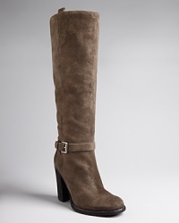 With rugged good looks, these sophisticated suede boots are finished off with elegant buckled straps; from Belle by Sigerson Morrison. With rugged good looks, these sophisticated suede boots are finished off with elegant buckled straps; from Belle by Sigerson Morrison.