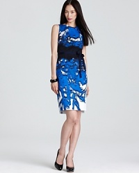 Boasting a splashy pattern and vibrant jolt of color, this T Tahari dress approaches summer style with fearless femininity. An acid-bright accent brightens up the back for a style that makes an impression from all angles. Boasting a splashy pattern and vibrant jolt of color, this T Tahari dress approaches summer style with fearless femininity. An acid-bright accent brightens up the back for a style that makes an impression from all angles.