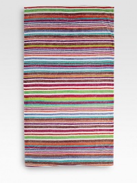Not your ordinary beach towel, this one has unbelievably rich color and a soft, luxurious feel that will last and last.Pre-washed and pre-shrunkThick terryCotton70L X 40WMachine washMade in USA Not your ordinary beach towel, this one has unbelievably rich color and a soft, luxurious feel that will last and last.Pre-washed and pre-shrunkThick terryCotton70L X 40WMachine washMade in USA