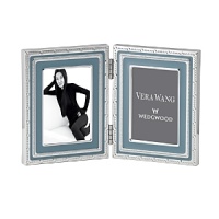 Vera Wang's With Love folding frame features seven intricate jewelry-inspired bands; a lovely display for your fondest memories or a thoughtful gift for a friend.