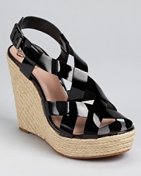 In a unique hue dubbed overcast (somewhere between blue and grey), these covetable wedges offer summer style with mysterious, moody edge. From VINCE CAMUTO. In a unique hue dubbed overcast (somewhere between blue and grey), these covetable wedges offer summer style with mysterious, moody edge. From VINCE CAMUTO.