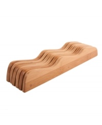 Come into counter space with the innovative genius of an in-drawer knife block. Made from 100% bamboo, this attractive accent provides the solid and durable space to store your sharpest knives. The curved design positions knives at two levels for easy access and removal. Come into counter space with the innovative genius of an in-drawer knife block. Made from 100% bamboo, this attractive accent provides the solid and durable space to store your sharpest knives. The curved design positions knives at two levels for easy access and removal.