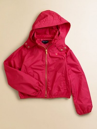 An essential in crisp, water-repellent microfiber designed with a protective hood, elasticized hem and tailored touches.Mockneck collar Attached hood has two-snap flap that covers the collar for extra protection Front zipper Long raglan sleeves Elasticized cuffs and hem Angled welt pockets Polyester Machine wash Imported